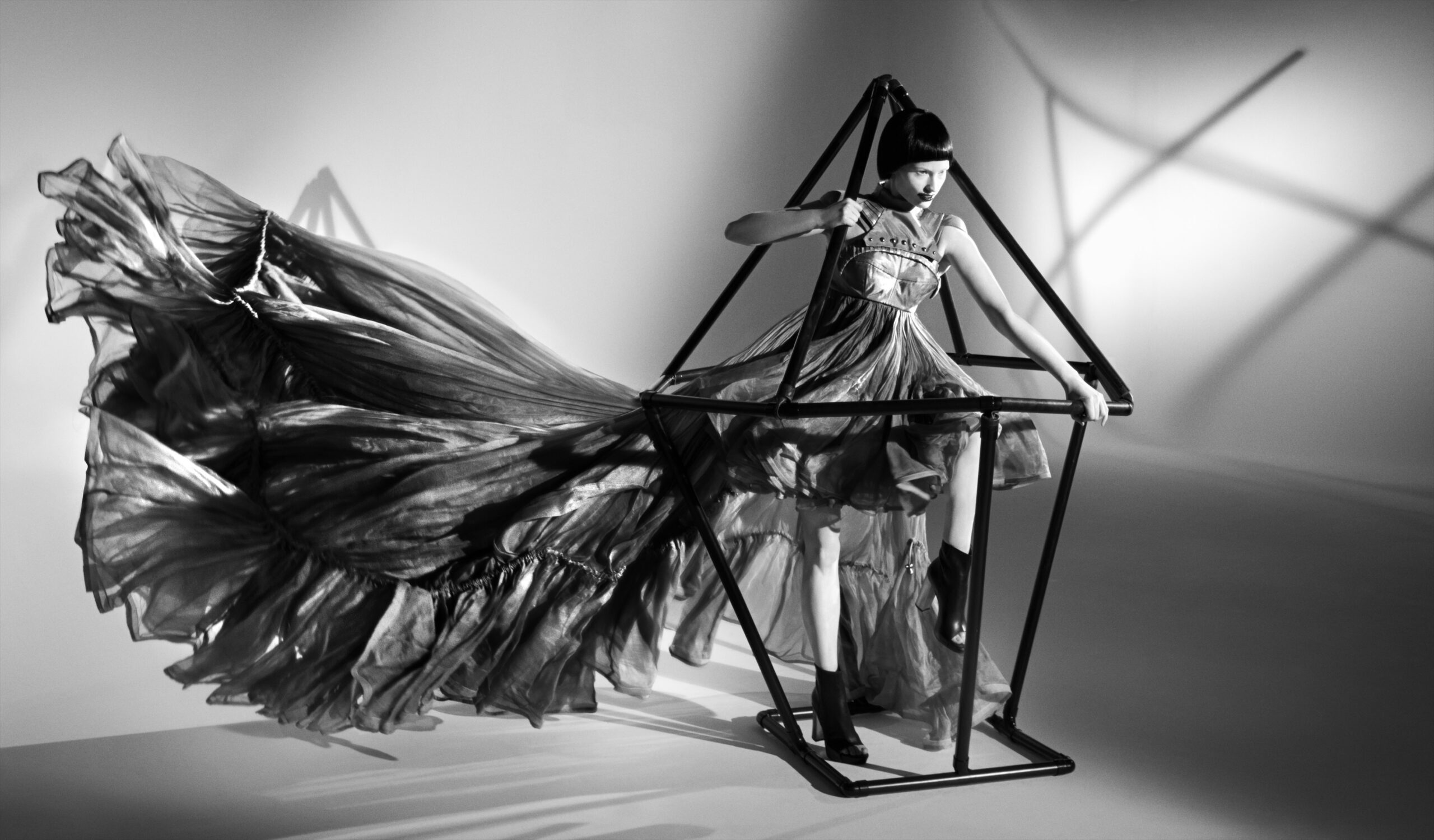 Abstract photo of Charles Lu's design worn by a model.