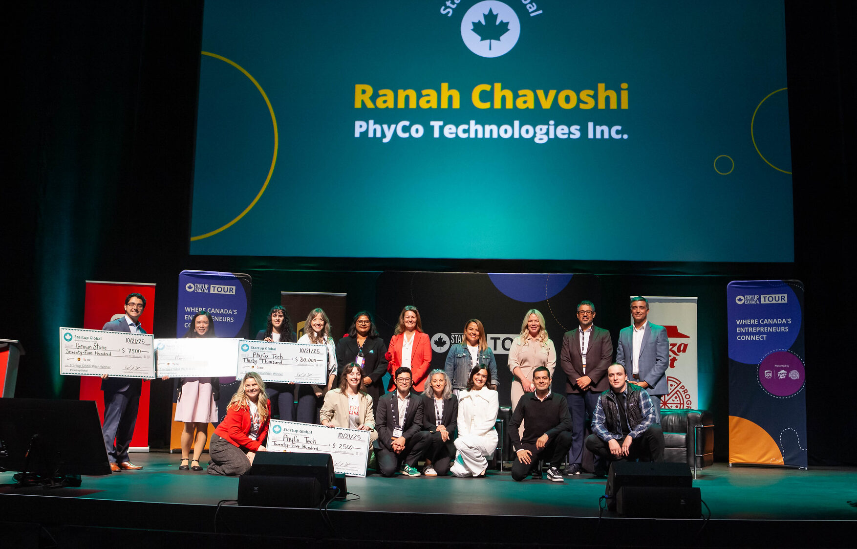 Global winners and judges on stage